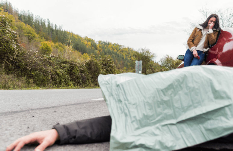 Bodily Damage in Israel - covered body of person killed in car crash